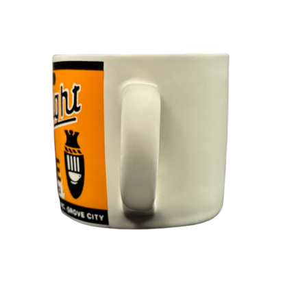 Side view of white ceramic mug with handle and orange retro label Yester Year Daily Delight vintage coffee mug for collectors