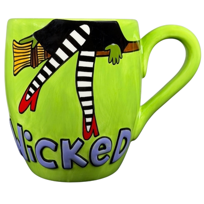Wicked Wizard of Oz flying monkeys mug in bright green with whimsical witch design