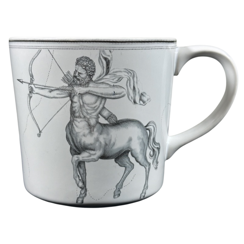 Williams Sonoma astrology mug featuring a detailed black and white illustration of the Sagittarius centaur with bow and arrow