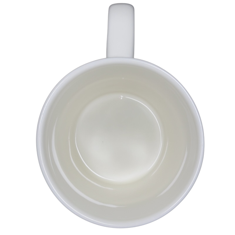 Inside view of the Queen Bee Rory Dobner Monogram Mug Williams Sonoma in white ceramic