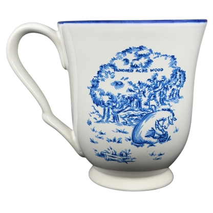 Disney Winnie the Pooh Eeyore footed collectible mug featuring scenic Hundred Acre Wood design