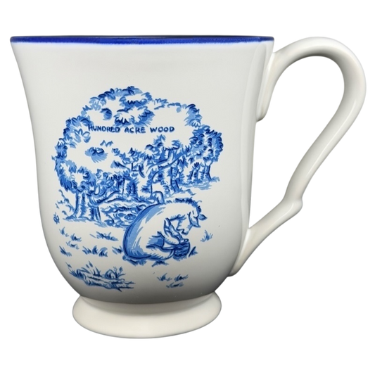 Winnie the Pooh Eeyore footed collectible mug featuring a blue design of the Hundred Acre Wood