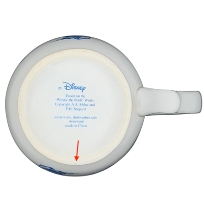 Winnie the Pooh footed collectible mug with detailed design and Disney branding