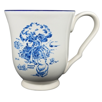 Winnie the Pooh footed collectible mug featuring Pooh and his house in blue design