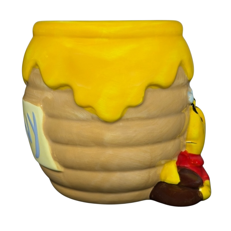 Disney Winnie the Pooh Hunny 3D mug designed like a honey pot with Pooh holding honey