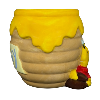 Disney Winnie the Pooh Hunny 3D mug designed like a honey pot with Pooh holding honey