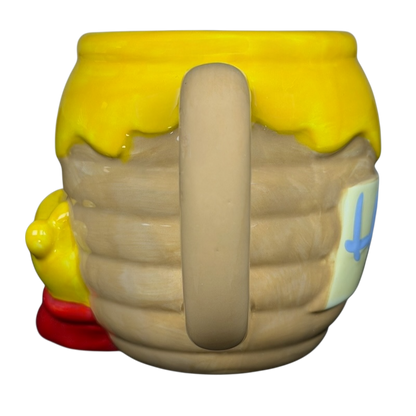 Disney Winnie the Pooh Hunny 3D mug designed to resemble a honey pot with a cute side handle