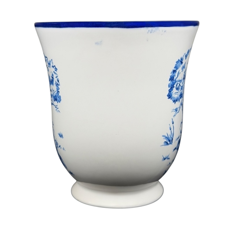 Disney Winnie the Pooh Piglet footed collectible mug with blue floral design on a white background