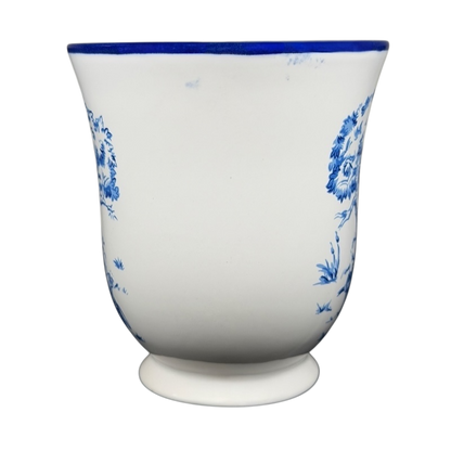 Disney Winnie the Pooh Piglet footed collectible mug with blue floral design on a white background