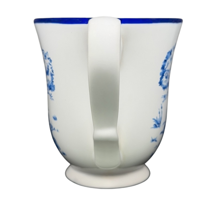 Winnie the Pooh Piglet footed collectible mug with intricate floral design and sturdy handle