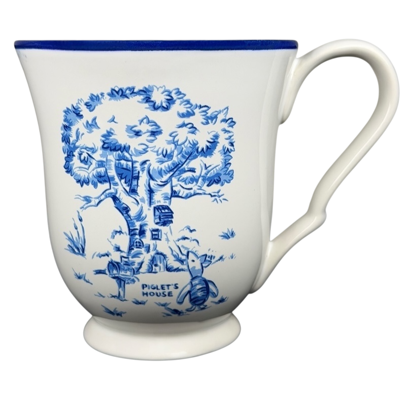 Disney Winnie the Pooh Piglet footed collectible mug featuring Piglet's house and tree design