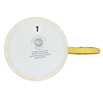 Bottom view of Winnie The Pooh Sweet Dreams Moon Handle Mug with yellow handle and printed details