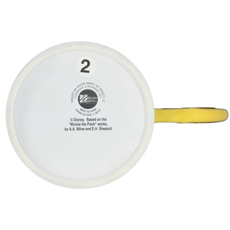 Bottom view of Winnie The Pooh Sweet Dreams Moon Handle Mug with bright yellow handle