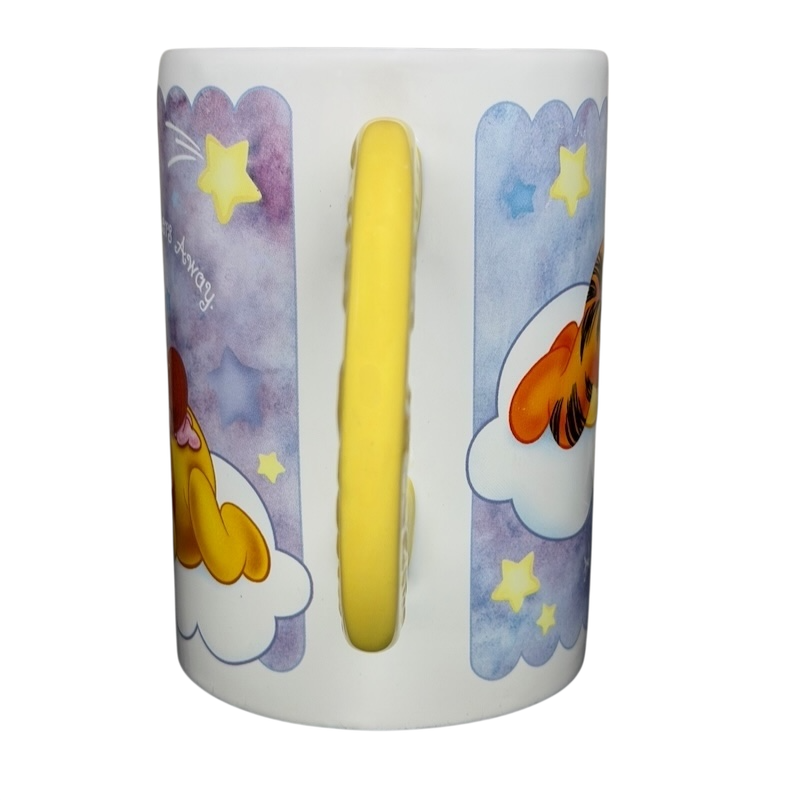 Winnie The Pooh Sweet Dreams Moon Handle Mug featuring colorful designs of Pooh and Tigger on a night sky