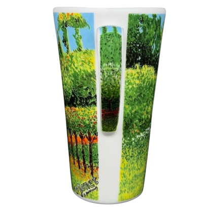 Chaleur Woman in the Garden Claude Monet Mug featuring vibrant garden artwork with green and colorful foliage