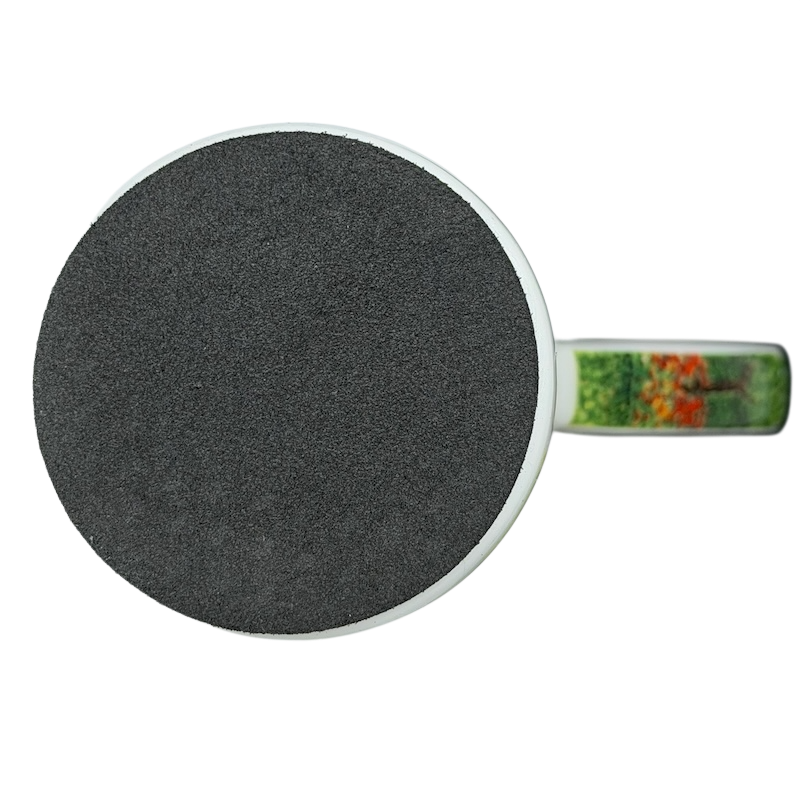Top view of Woman in the Garden Claude Monet Mug Chaleur with a handle and vibrant garden design