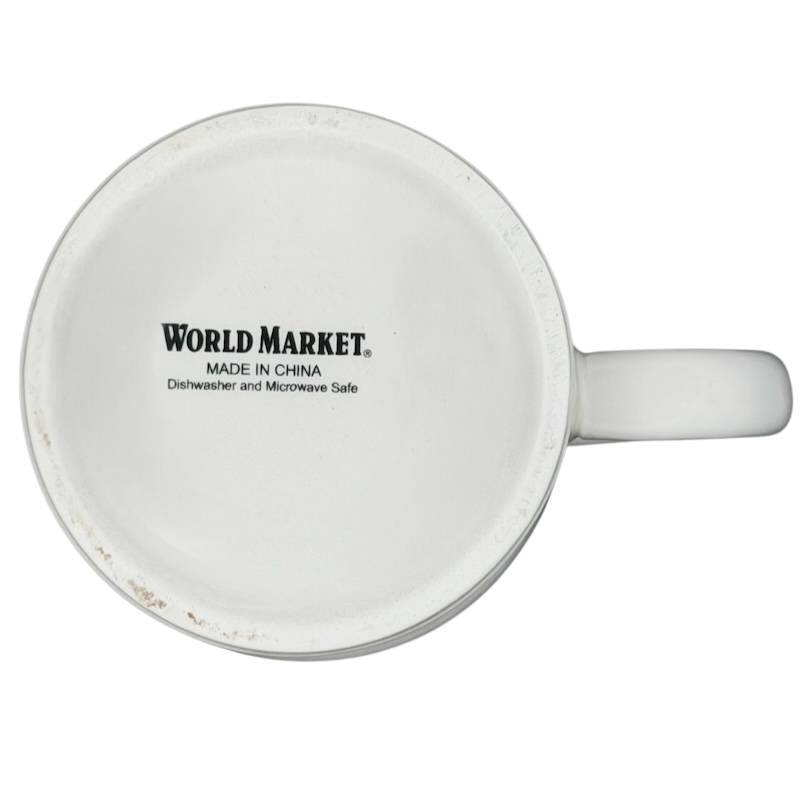 Bottom view of a zebra mug world market collectible marked dishwasher and microwave safe