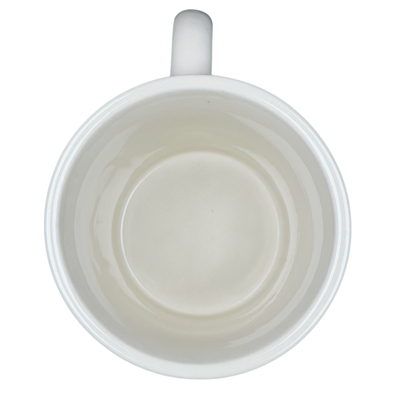 Inside view of the zebra mug world market collectible with a smooth white finish