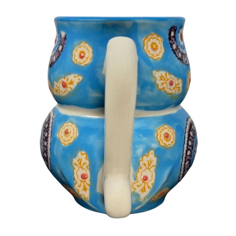 Yokohama Studios owl collectible mug featuring a vibrant blue design with floral patterns