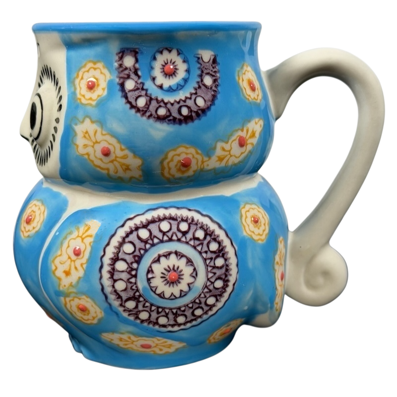 Yokohama Studios owl collectible mug with vibrant blue and floral patterns