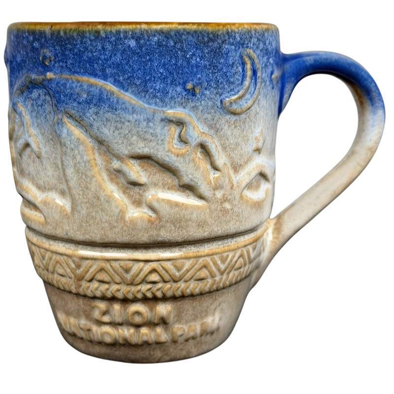 Zion National Park mug featuring embossed mountain design and a blue ombre finish