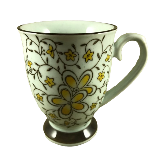 Yellow Flowers Pedestal With Fancy Handle And Brown Trim Mug