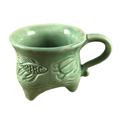 Three Legged With Etched Fish And Turtles Mug
