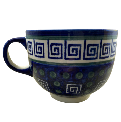 Boleslawiec Polish pottery soup mug featuring intricate blue spiral designs and a comfortable handle