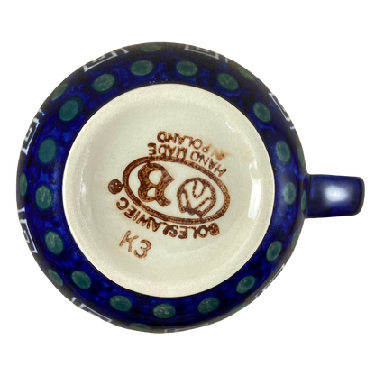 Top view of a Boleslawiec Polish pottery soup mug with intricate blue pattern and handle