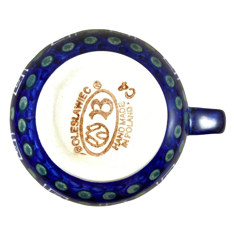 Boleslawiec Polish pottery soup mug featuring a vibrant blue design with polka dots