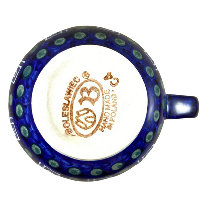 Boleslawiec Polish pottery soup mug featuring a vibrant blue design with polka dots