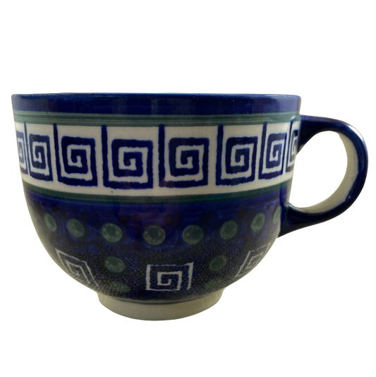 Boleslawiec Polish pottery soup mug in deep blue with decorative patterns and a sturdy handle