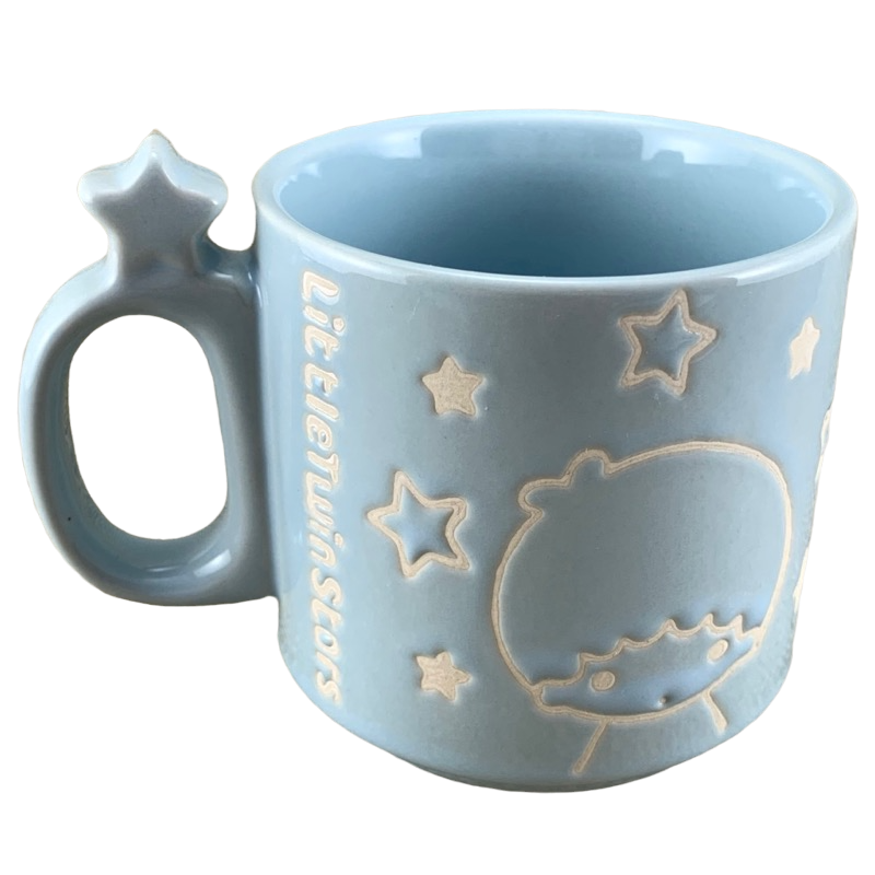 Sanrio Little Twin Stars collectible mug in pastel blue with star-shaped handle and embossed character design