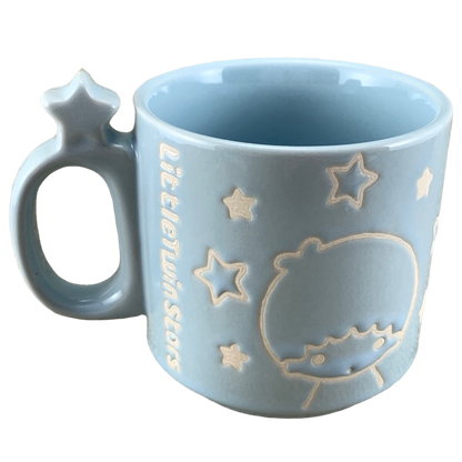 Sanrio Little Twin Stars collectible mug in pastel blue with star-shaped handle and embossed character design