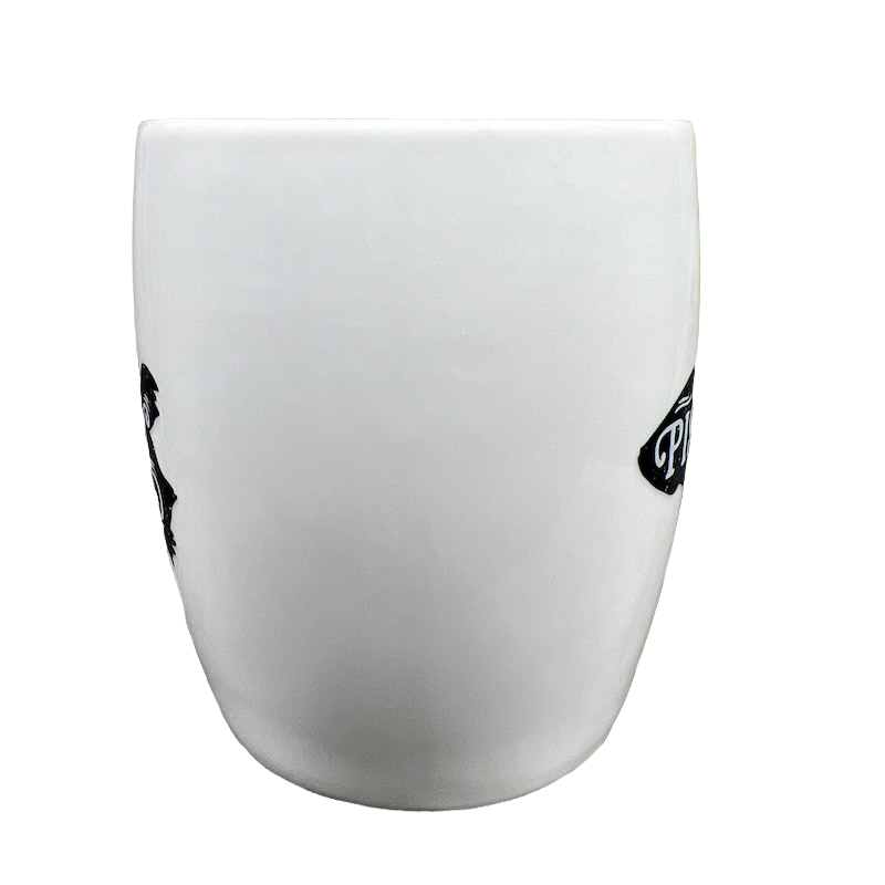 White ceramic Threshold Pisces astrology mug showing black Pisces zodiac artwork on side against black background