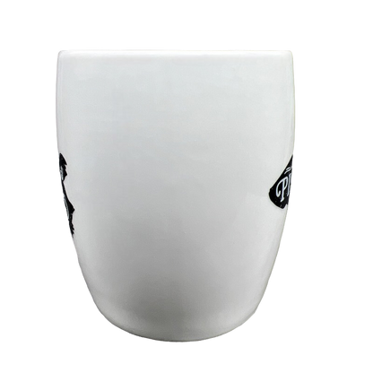 White ceramic Threshold Pisces astrology mug showing black Pisces zodiac artwork on side against black background