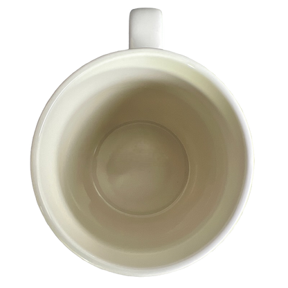 Top view of empty white Threshold Pisces astrology mug with handle showing smooth ceramic interior
